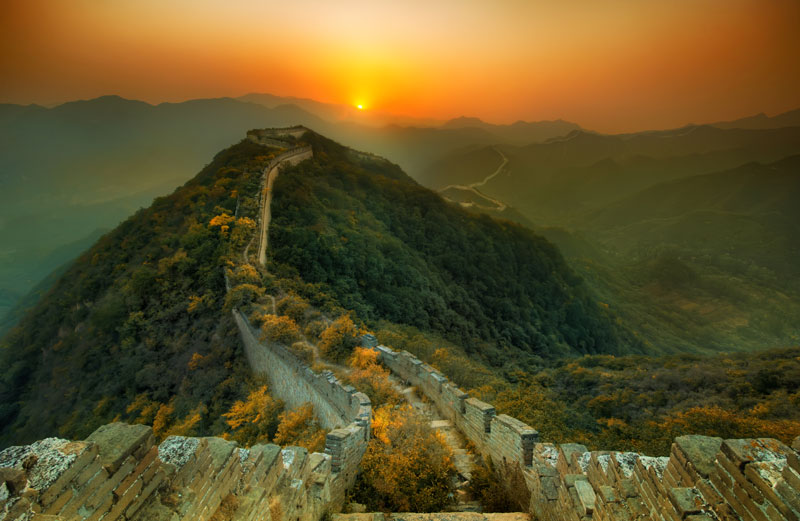 abandoned great wall of china nature overtaking growing over