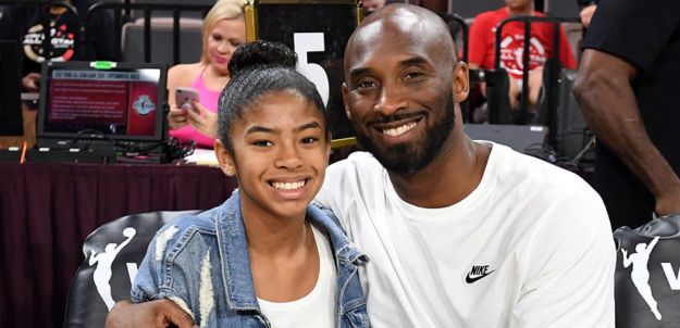 kobe bryant and daughter gianna at a game